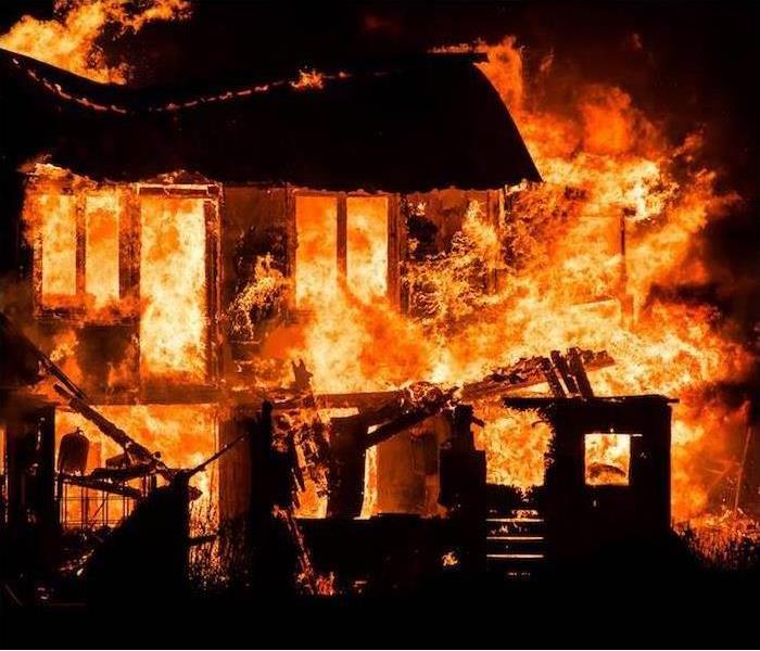 House consumed in flames